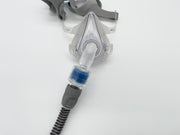 Heat moisture exchanger (HME) attached to CPAP hose and mask