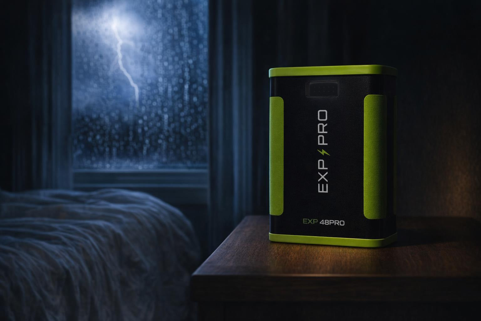 EXP PRO battery on a bedroom nightstand during a thunderstorm at night